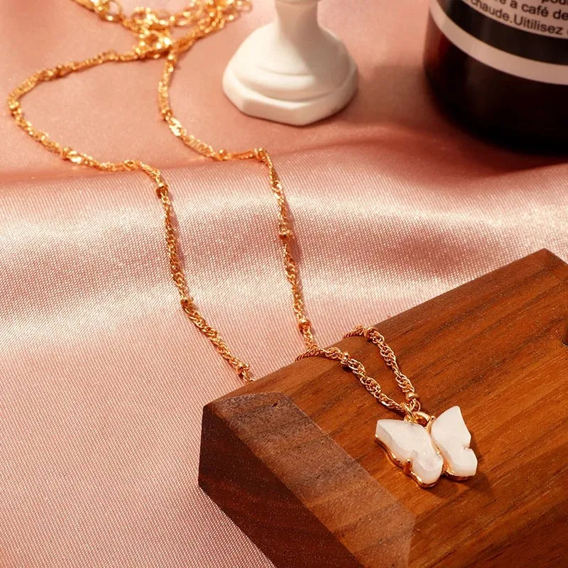 Combo of 2 Green Crystal and White Butterfly Pendant
